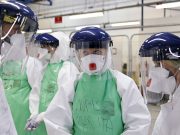 NHS staff clapped for construction teams as a guard of honour